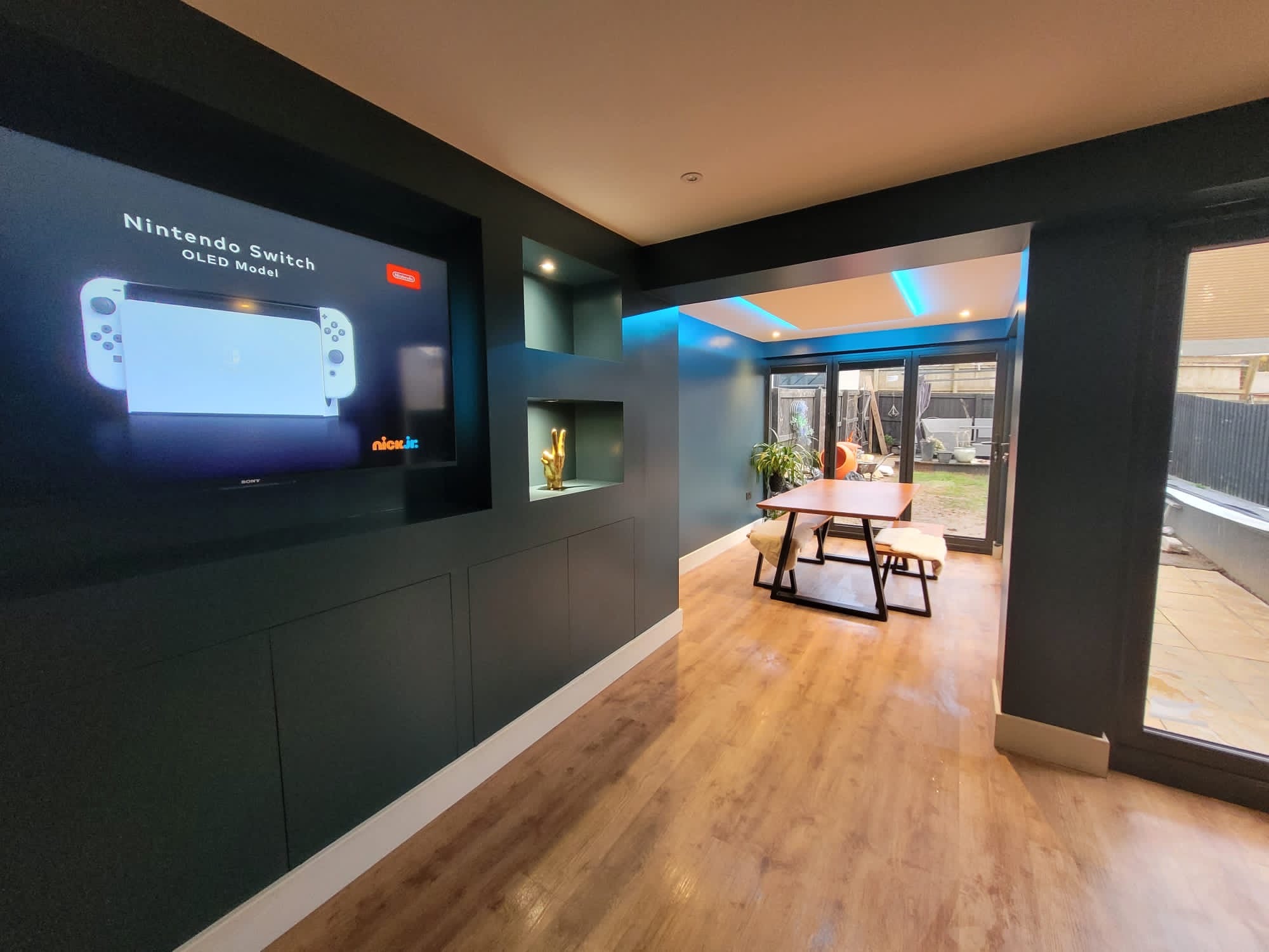 Bespoke Media Wall Installation with alcoves and hidden storage at Emotive AV Cornwall